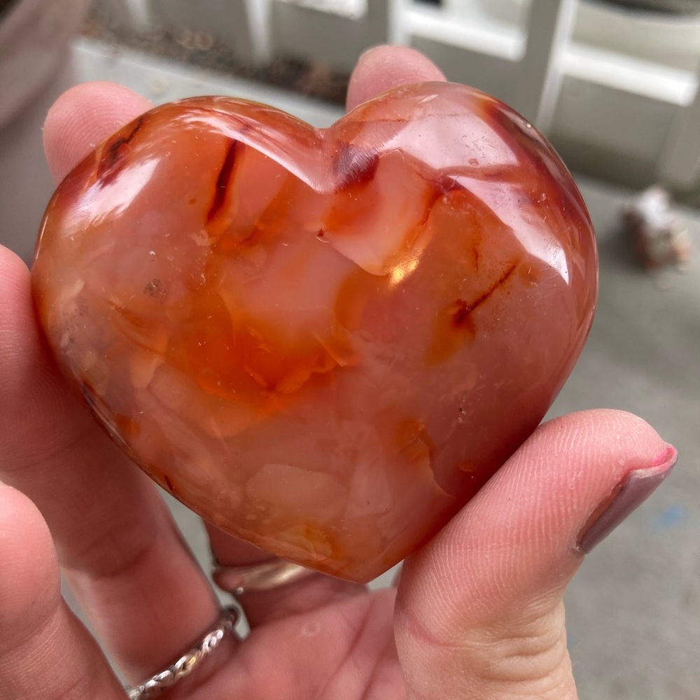 Stunning polished carnelian heart palmstone